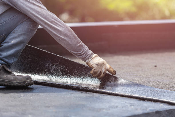 Professional Waterproofing technician working in Roslyn, NY
